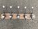 Wall-mounted coat rack with 5 hooks, solid wood, Maisons du Monde.