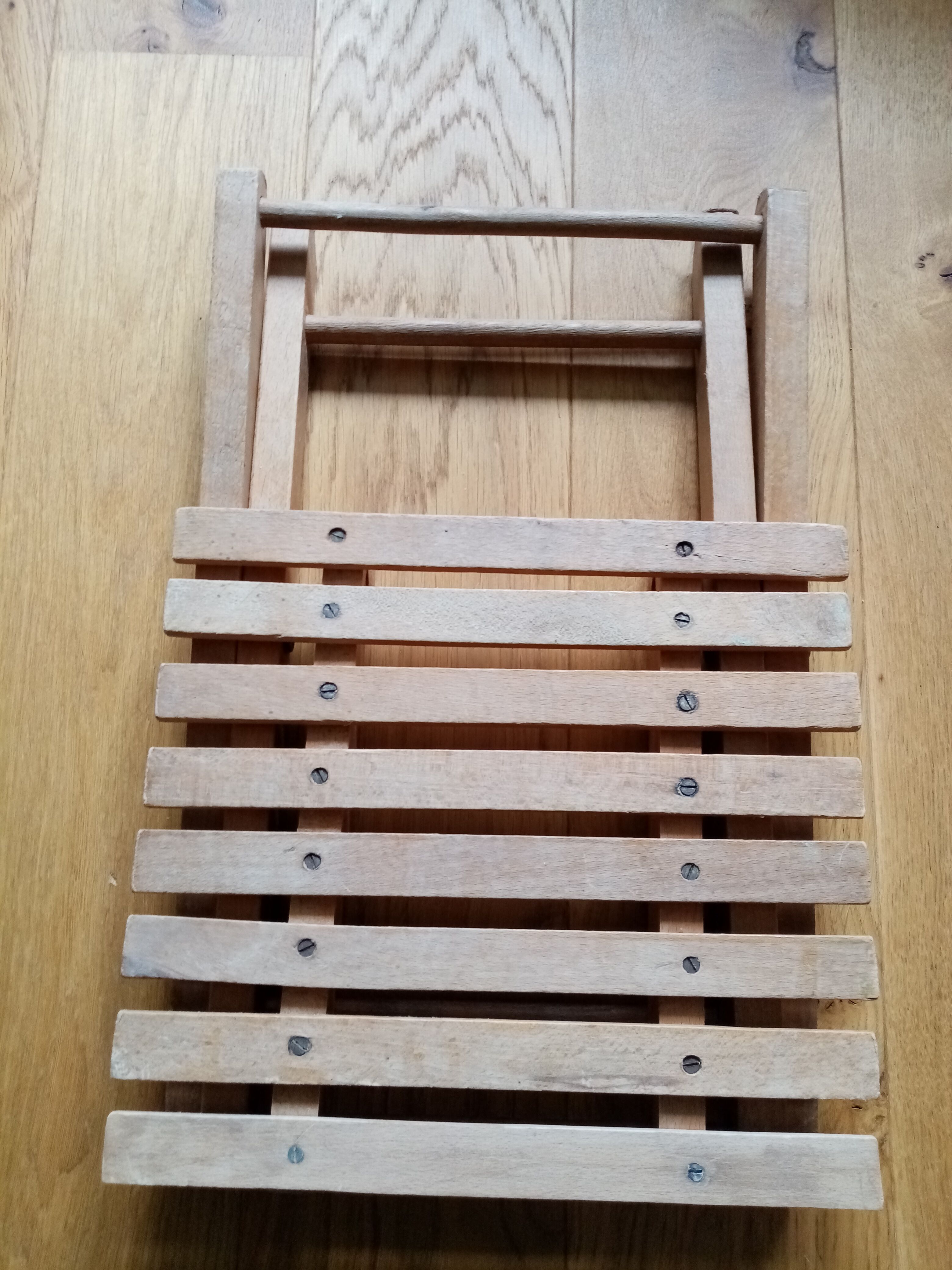Tabouret pliant porte-plante en bois