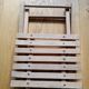 Tabouret pliant porte-plante en bois