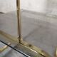 Side Table 1970s smoked glass/gold/wheels