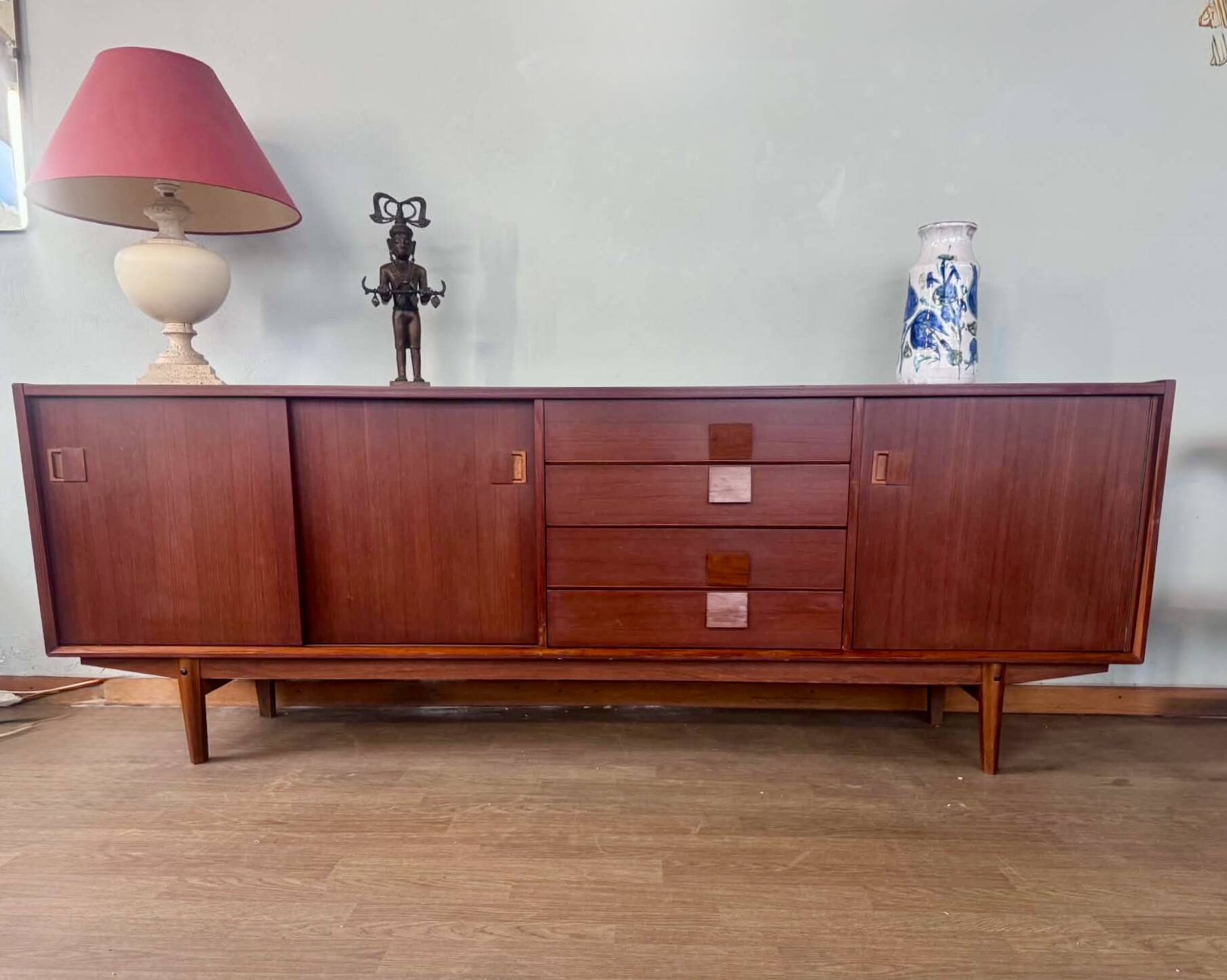 Scandinavian teak sideboard, 230 cm long, with 3 doors and 4 drawers.