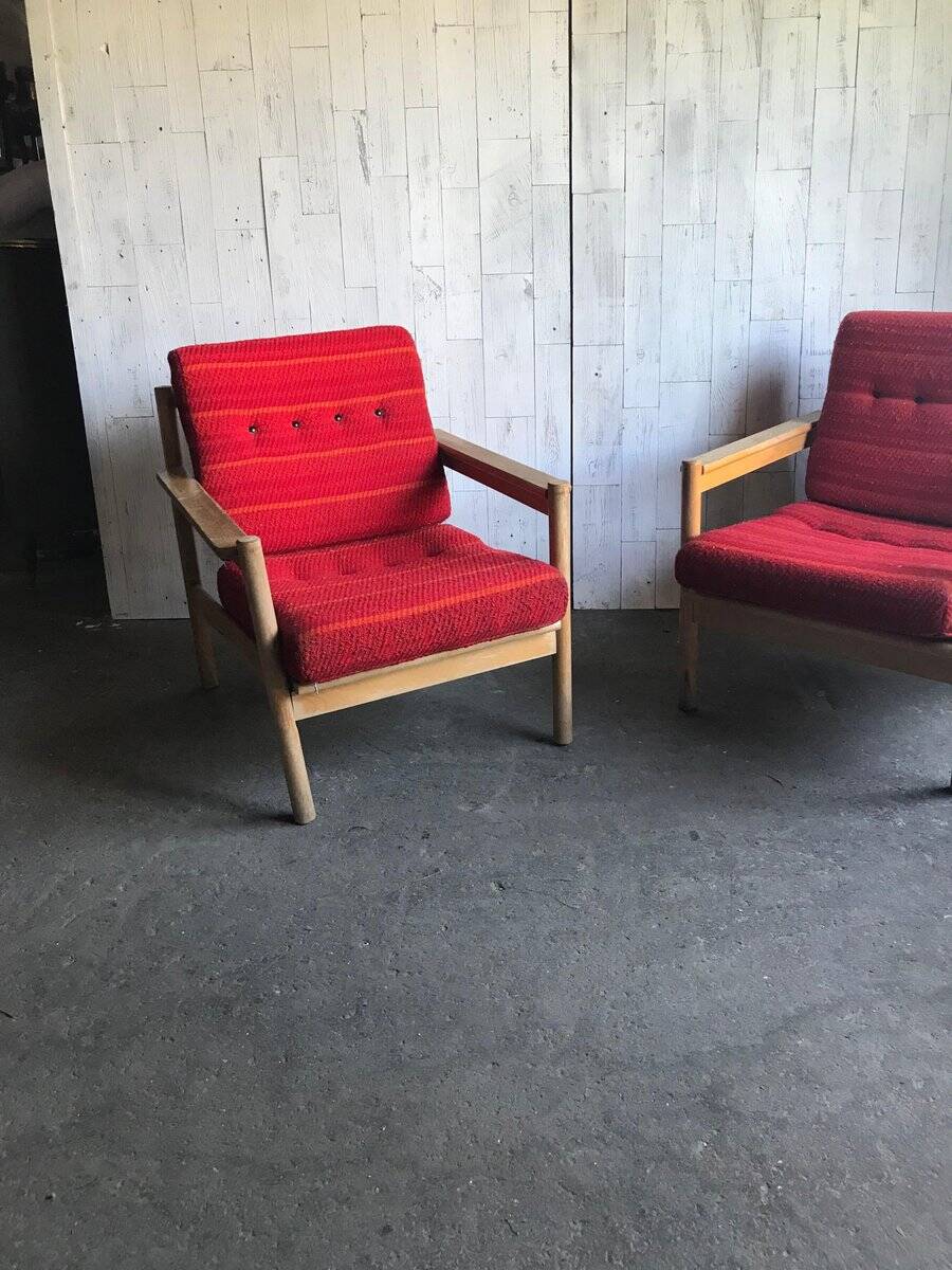 Set of mid-century red upholstered armchairs, 1960s Danish style.