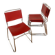 Set of 4 chairs in red leather and chrome tubular metal