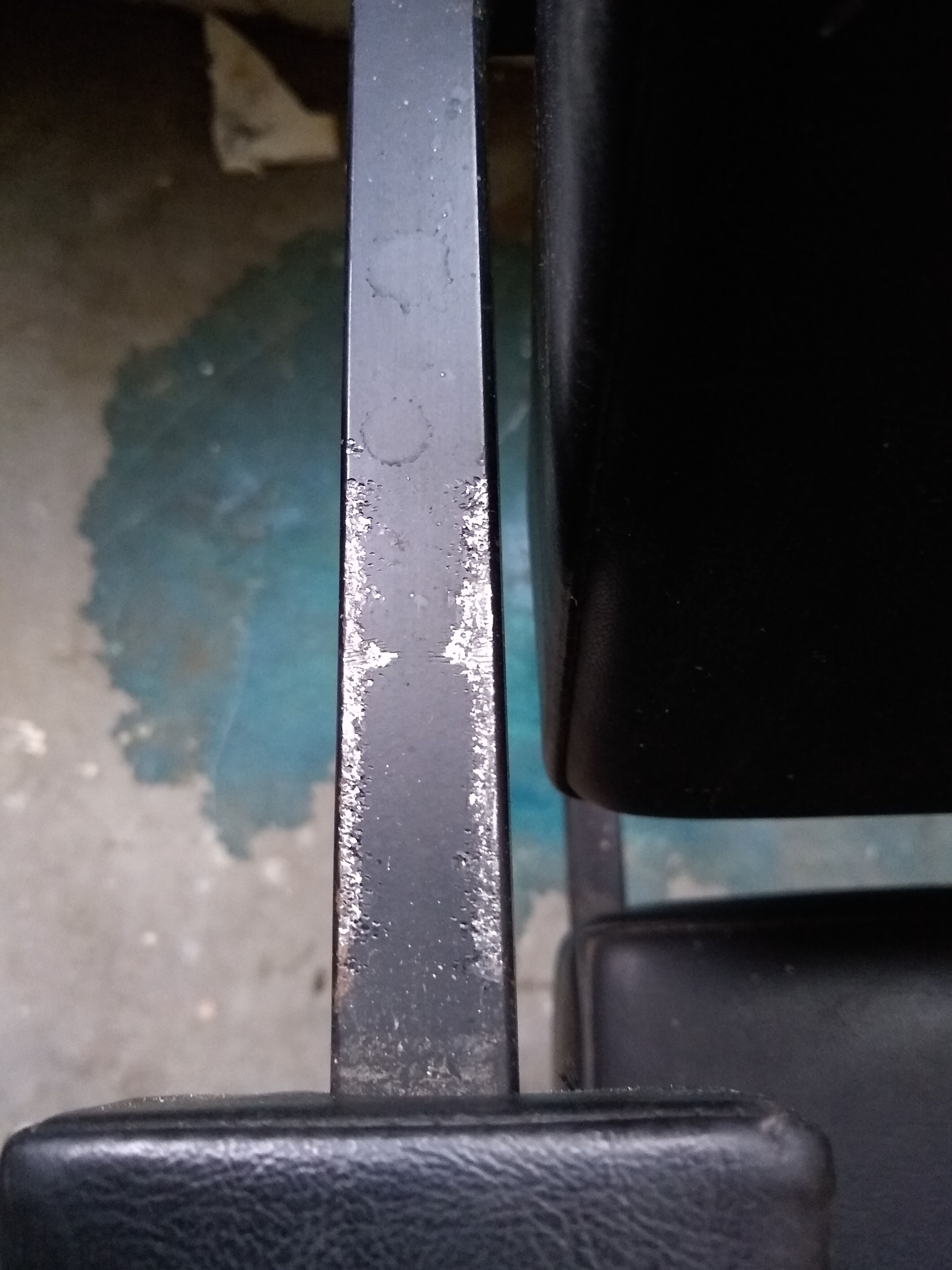 Armchair year 70 . Black skaï and black treated steel square tube. Good condition of the skaï