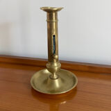 Antique brass push candle holder