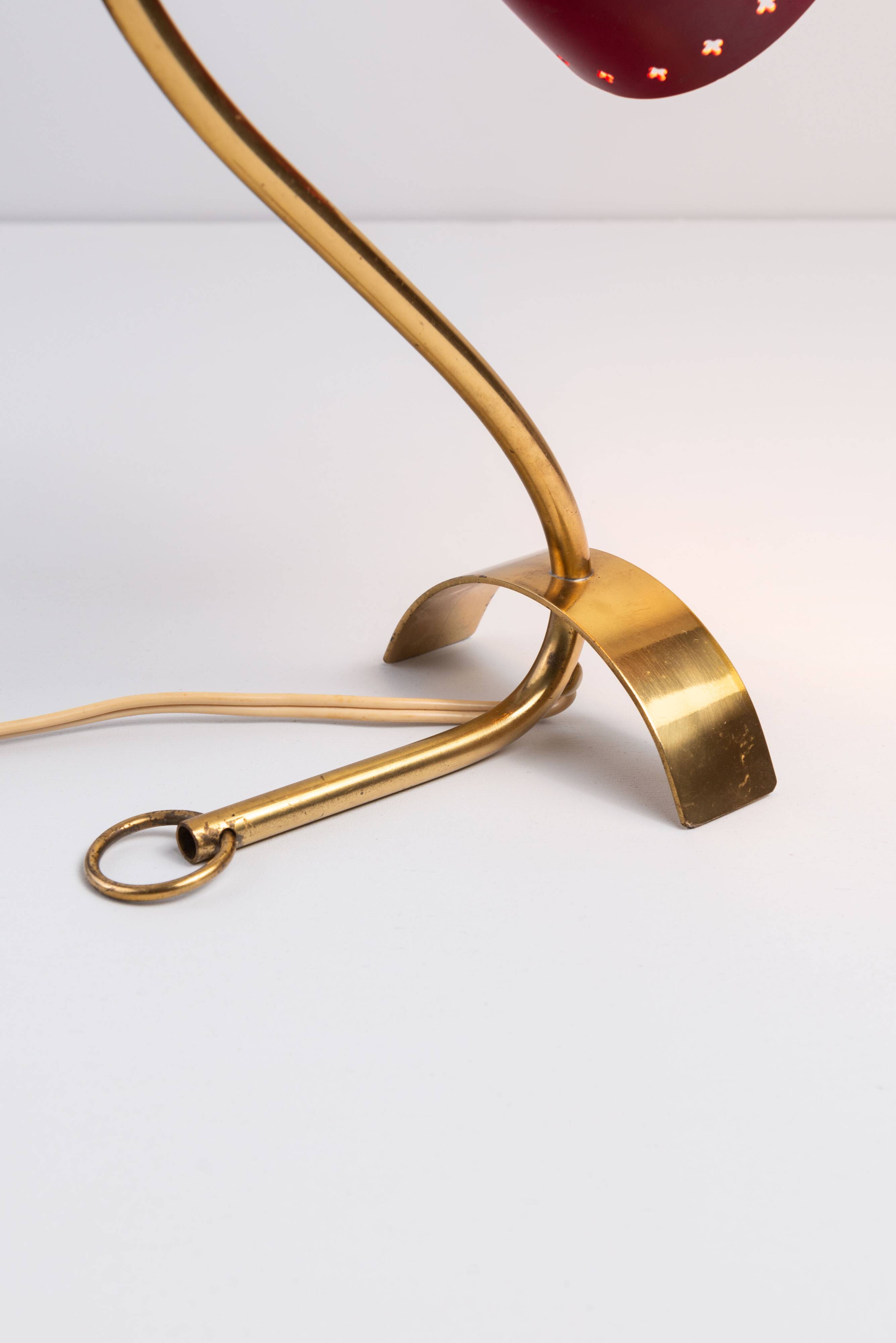 Brass wall lamp with perforated metal shade, 1950s, Sweden