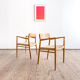 Paire de chaises de salle à manger modèle 56 par Niels O. Møller en chêne