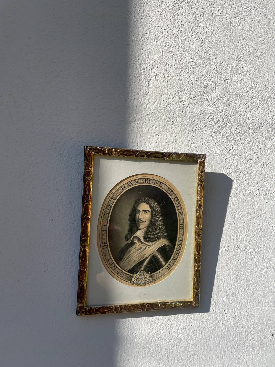 Classic antique man portrait in gilded frame
