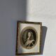 Classic antique man portrait in gilded frame