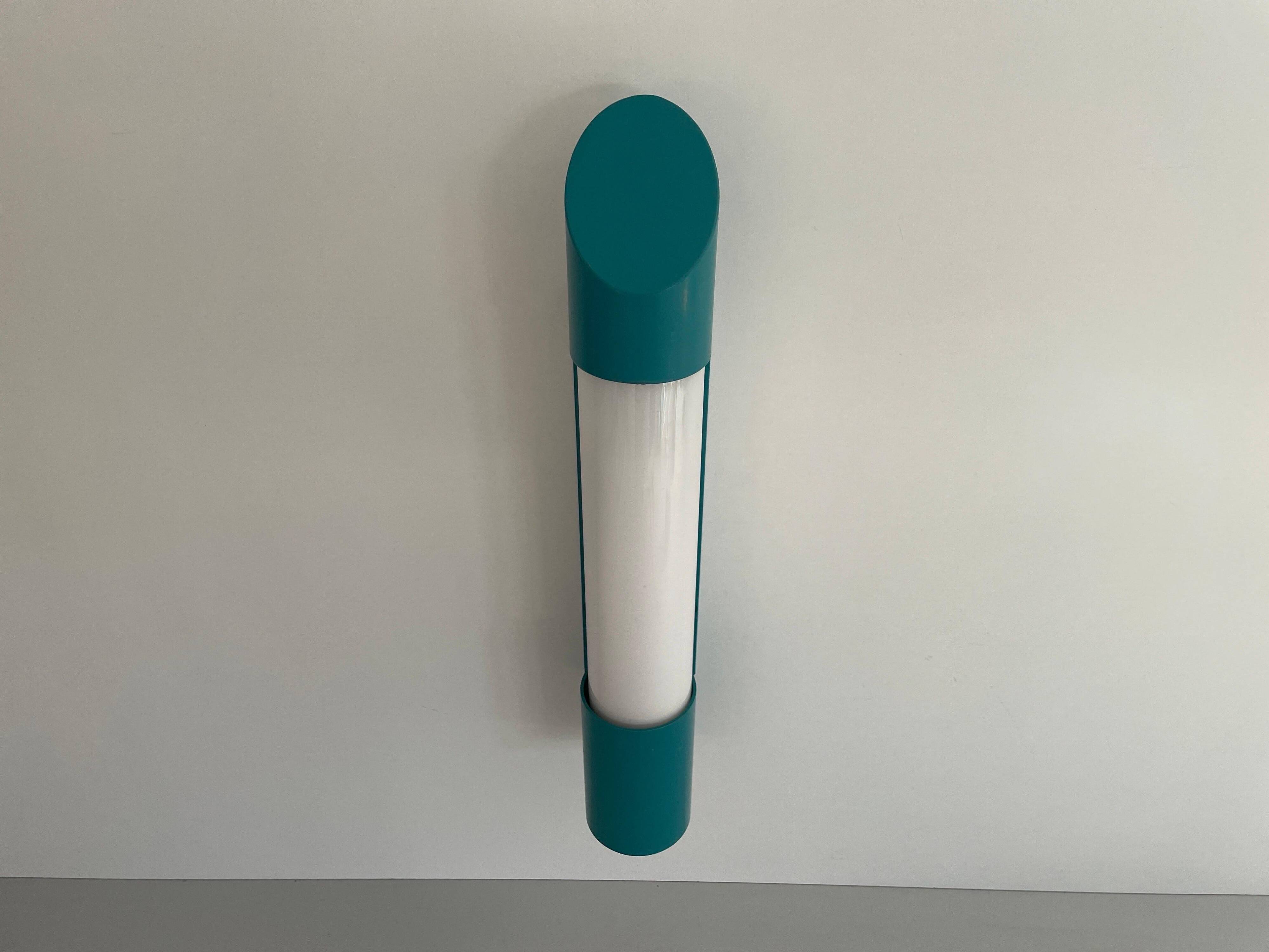 Simple cylindrical wall light in opal glass and turquoise metal, 1970s, Germany