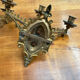 Elegant pair of three-light wall sconces from the 19th century.