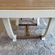 Restored oak table in natural wood and linen.