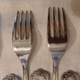Antique flatware set for 51 place settings