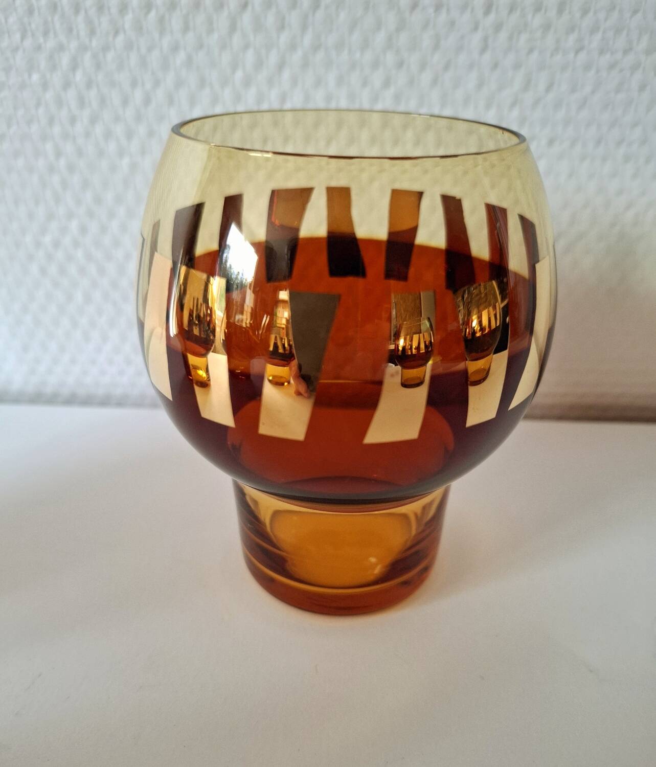 Carafe and its amber/golden glasses from the 70s.