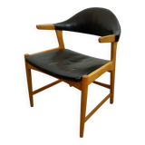 Danish armchair in oak and black leather