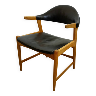 Danish armchair in oak and black leather