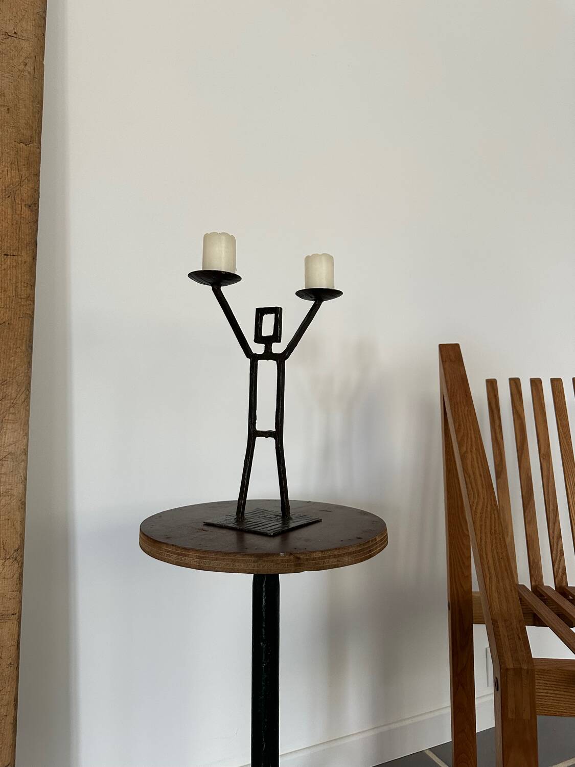 Vintage wrought iron anthropomorphic candle holder