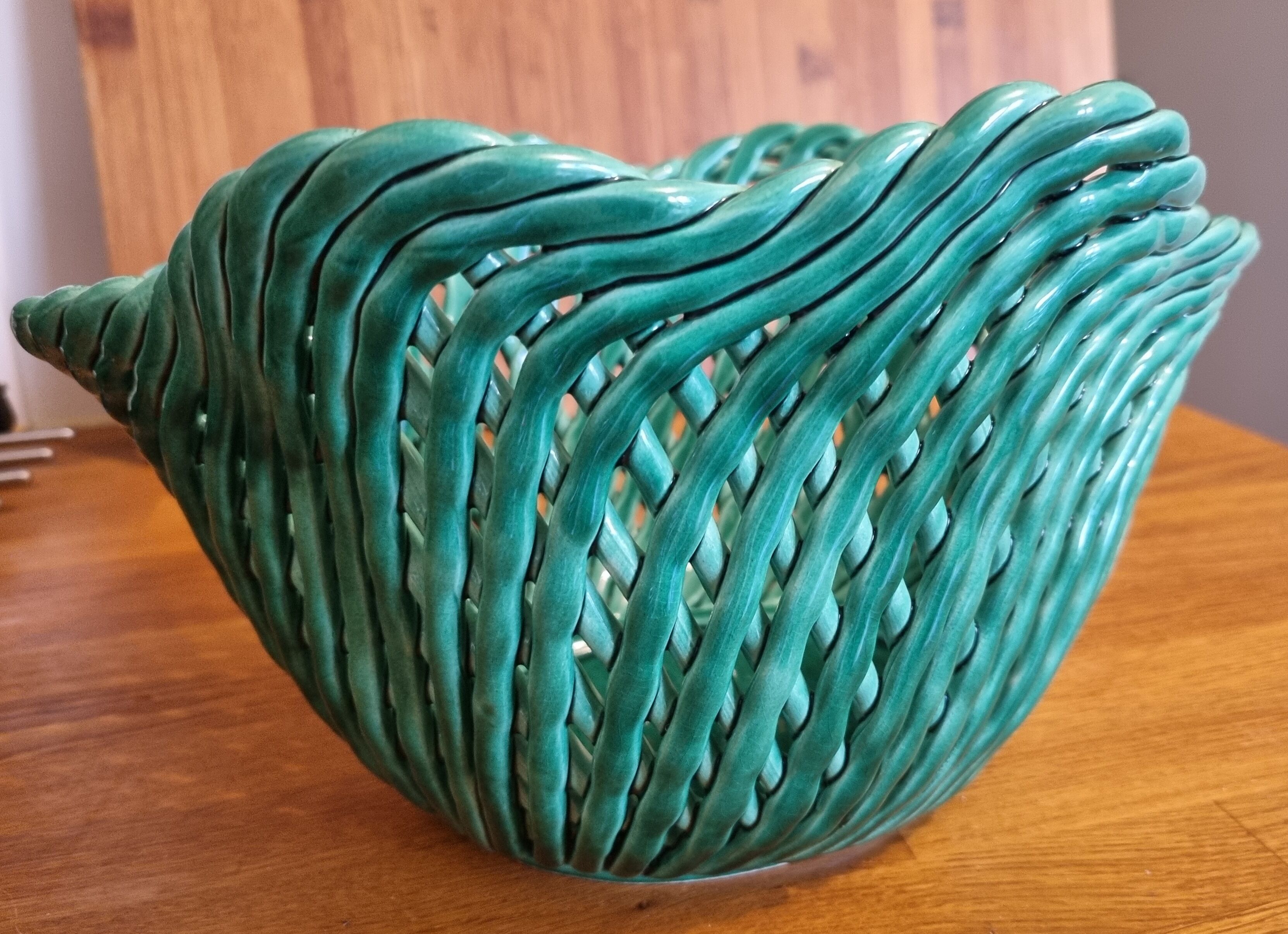 Vintage pot cover in woven slip green basket