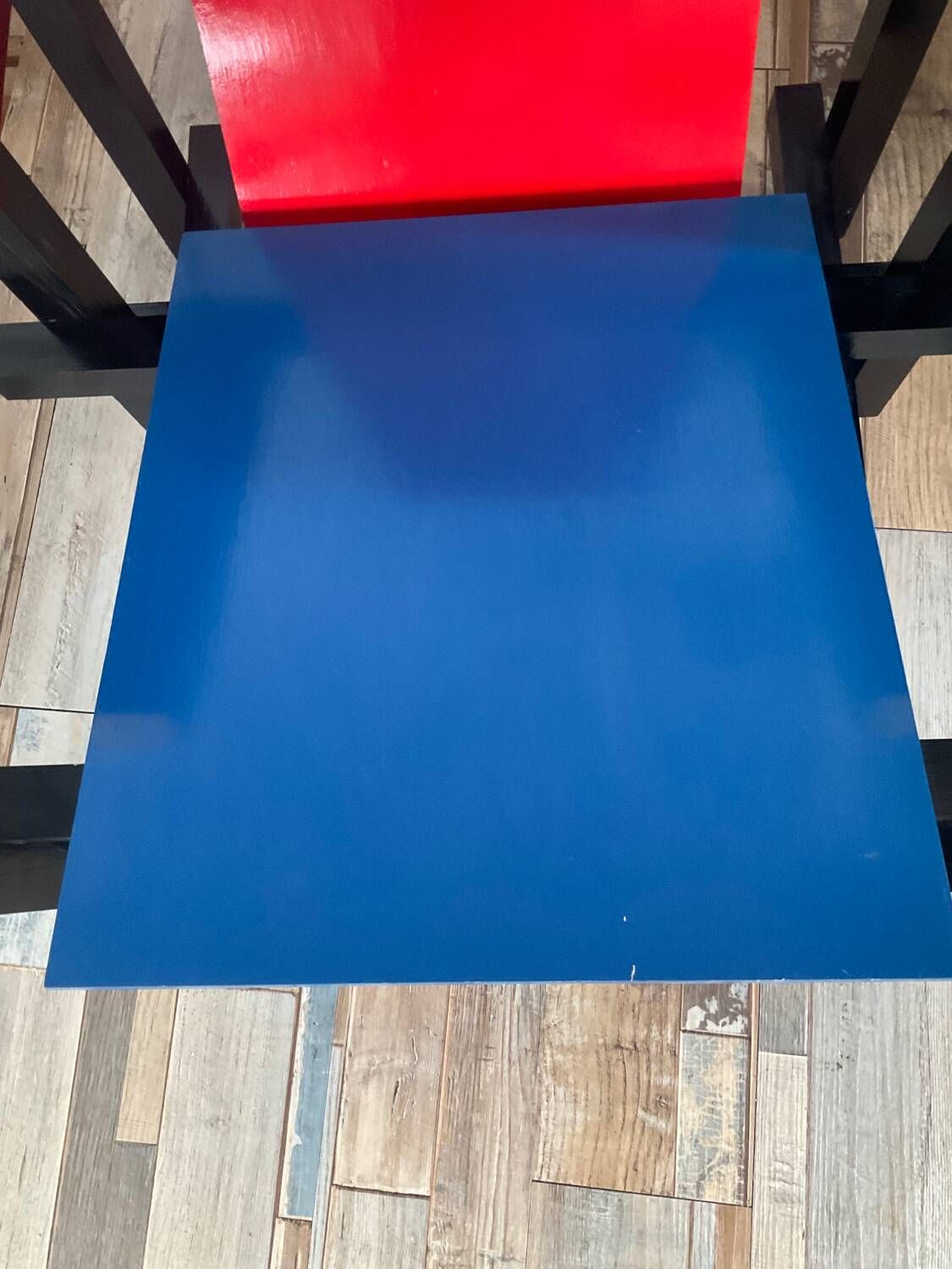 “Red and blue” lounge chair in the style of Gerrit Rietveld