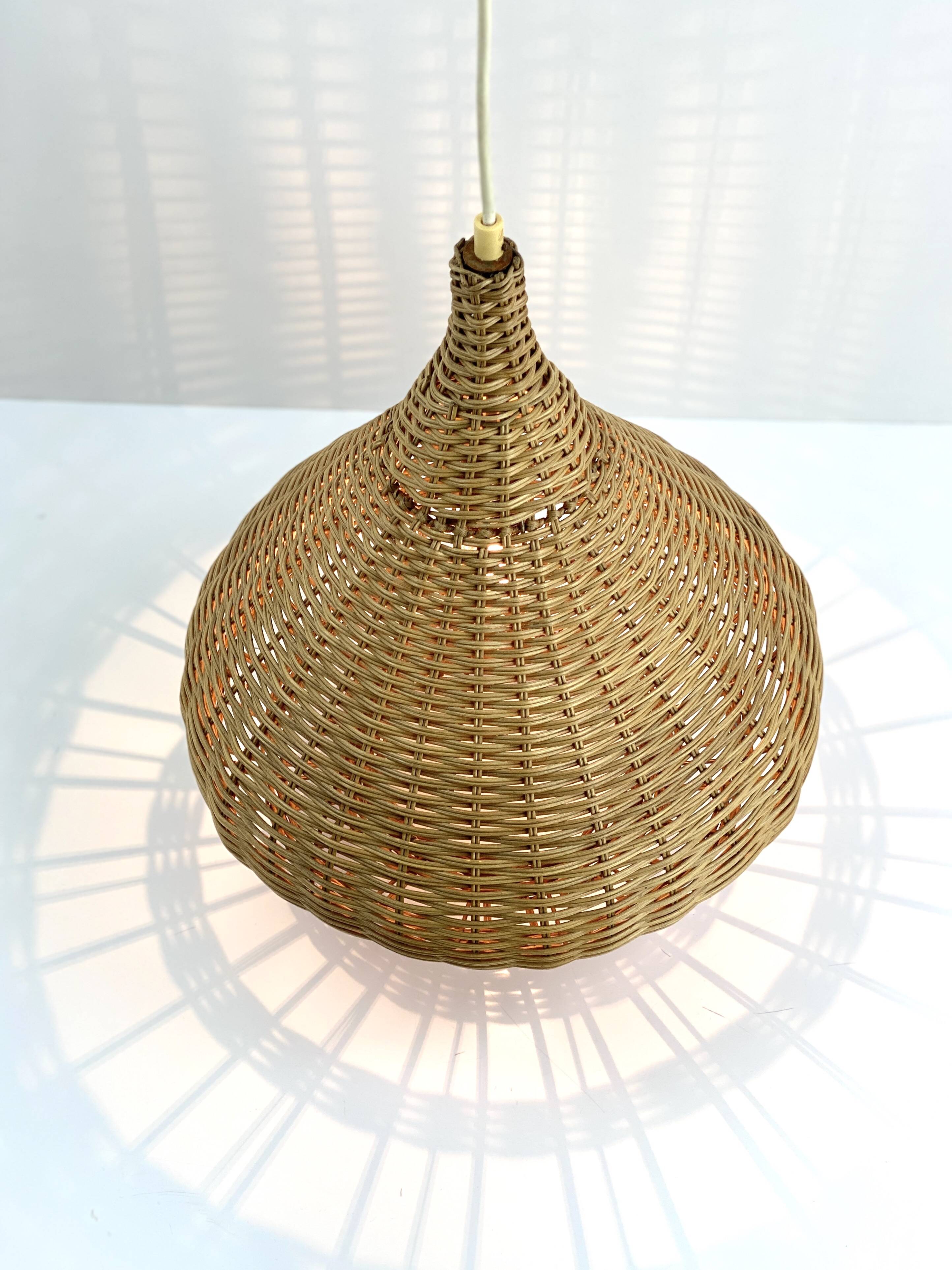 Vintage wicker pendant light from the 1960s.