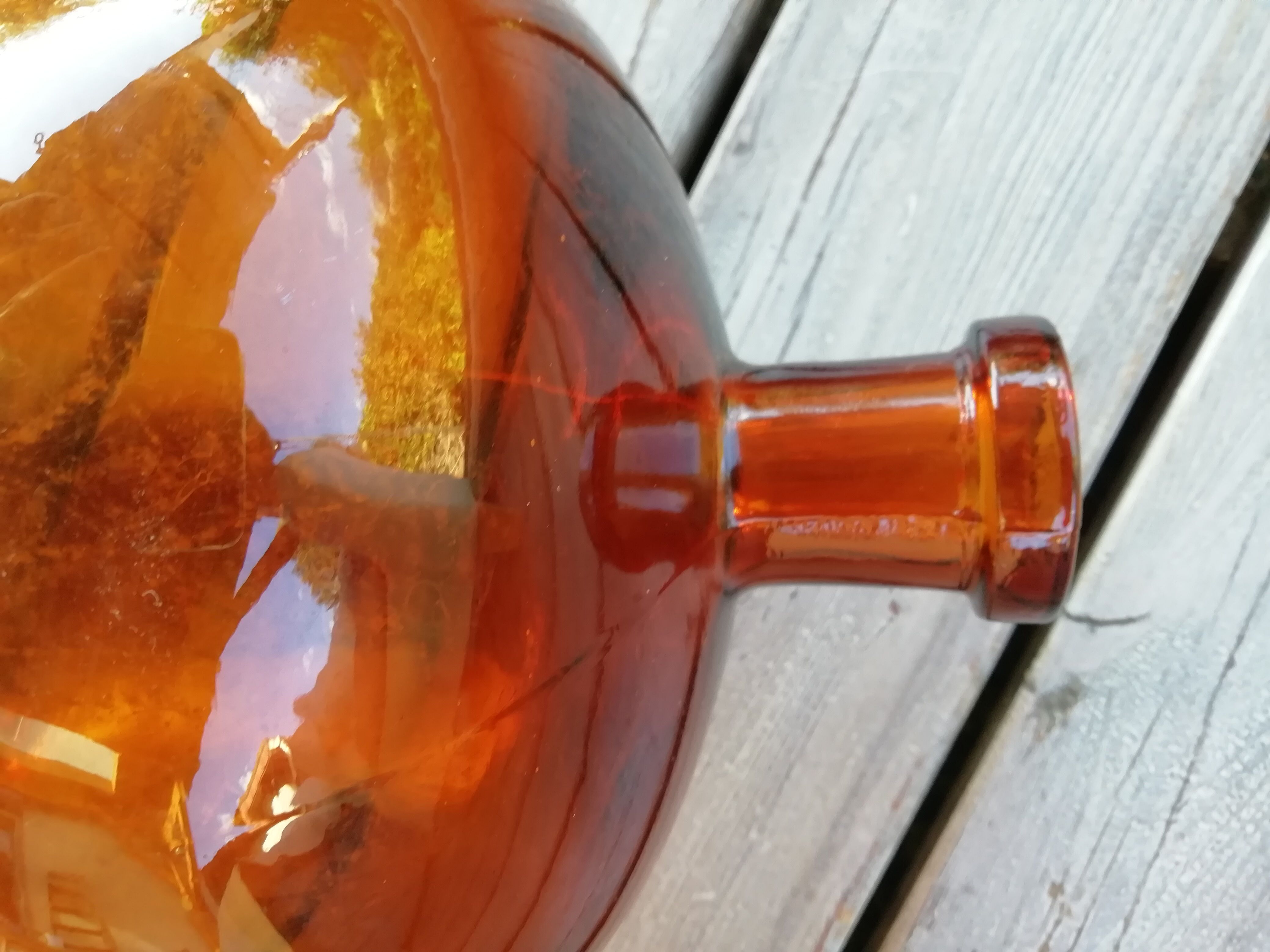 Amber color demijohn