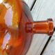 Amber color demijohn