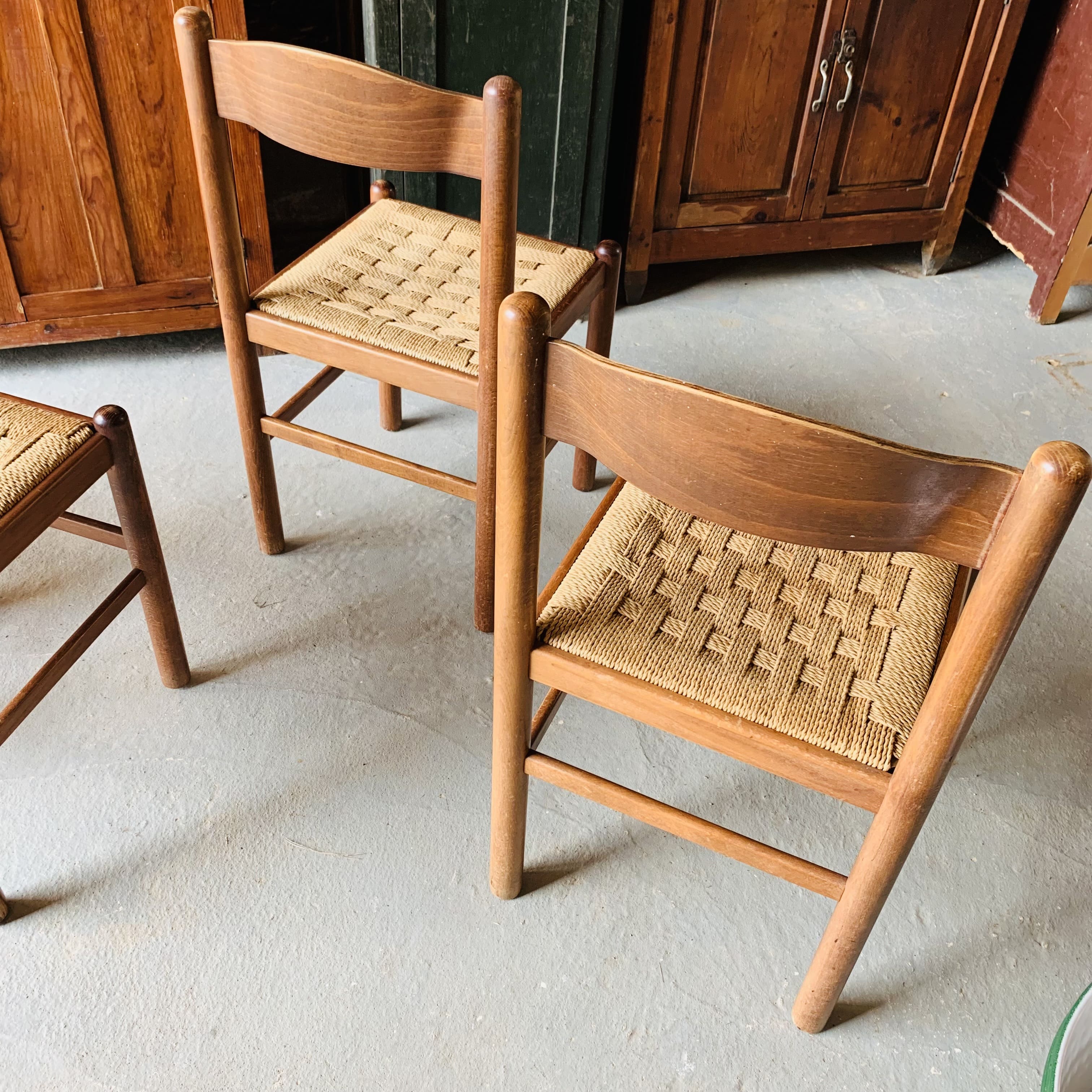 5 chairs made of wood and rope