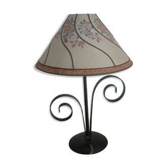 Lamp with wrought iron scrolls and old lampshade