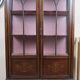 Antique English display cabinet. Marquetry with floral patterns and ribbons.