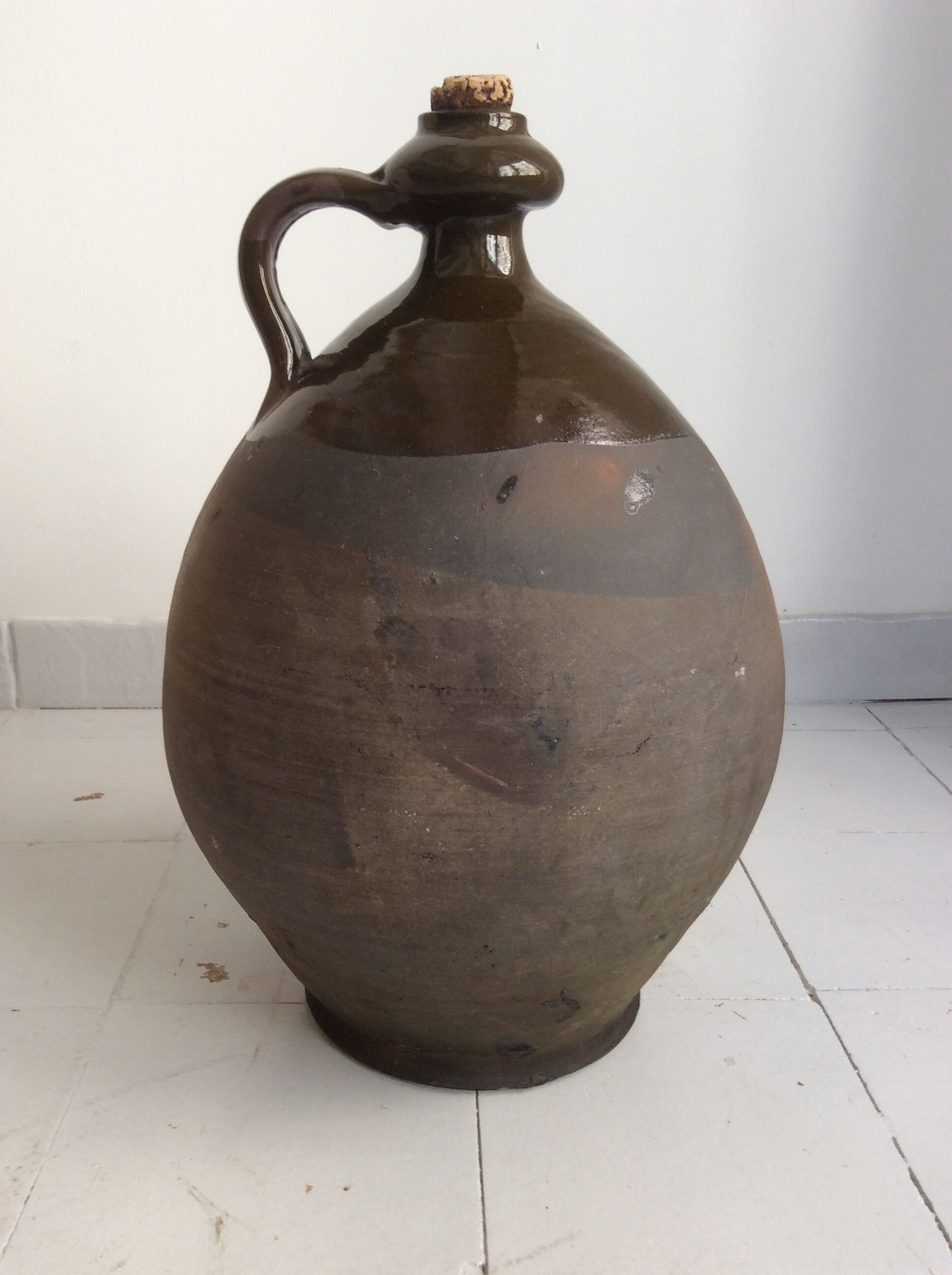 Old terracotta jug glazed Provençal