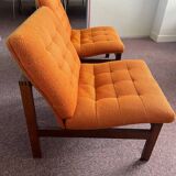 Pair of teak armchairs