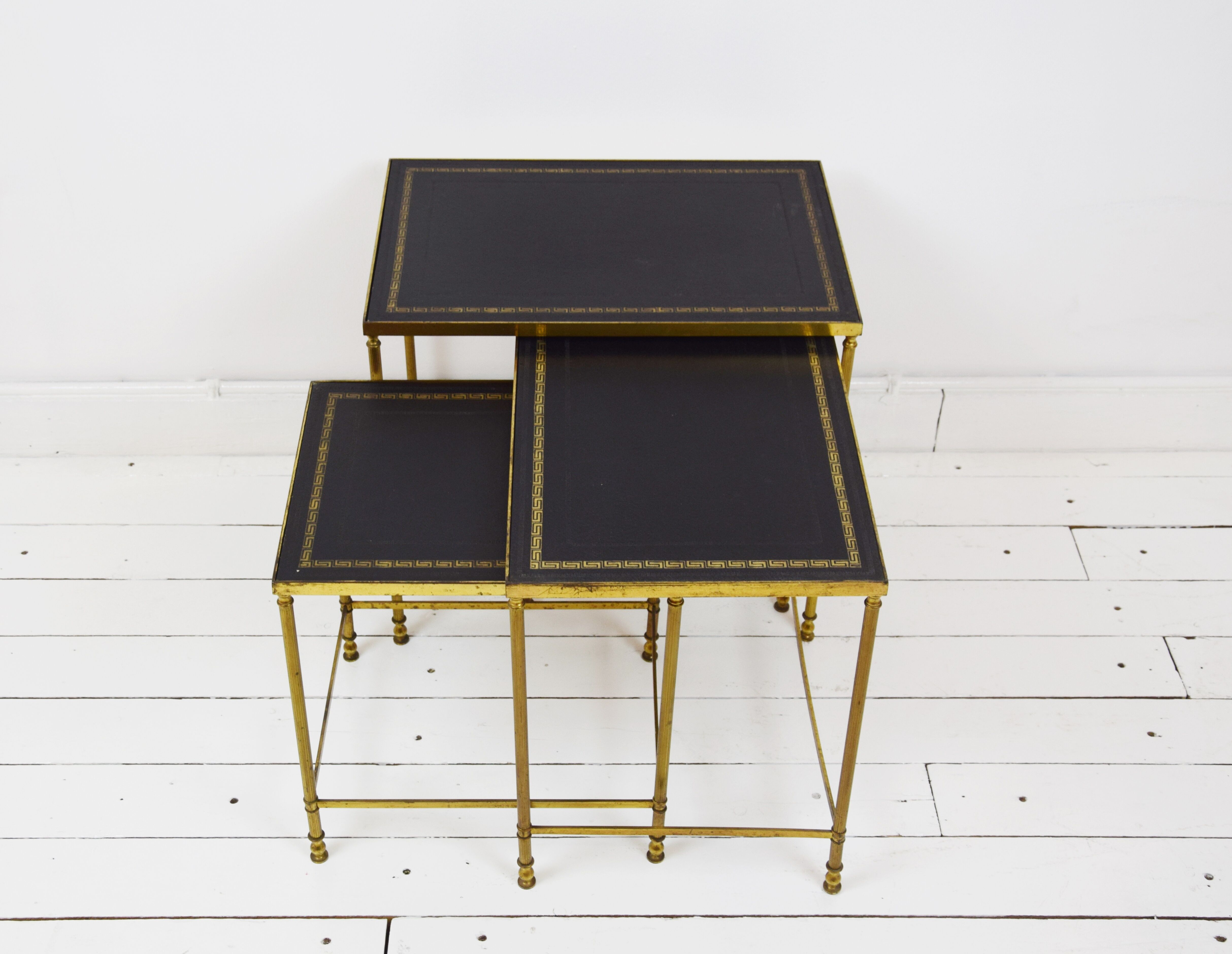 Brass and skaï side tables, 1950s