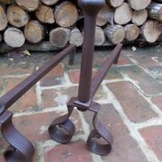 Paire de chenets en fonte