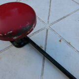 Vintage black and red metal wall coat rack