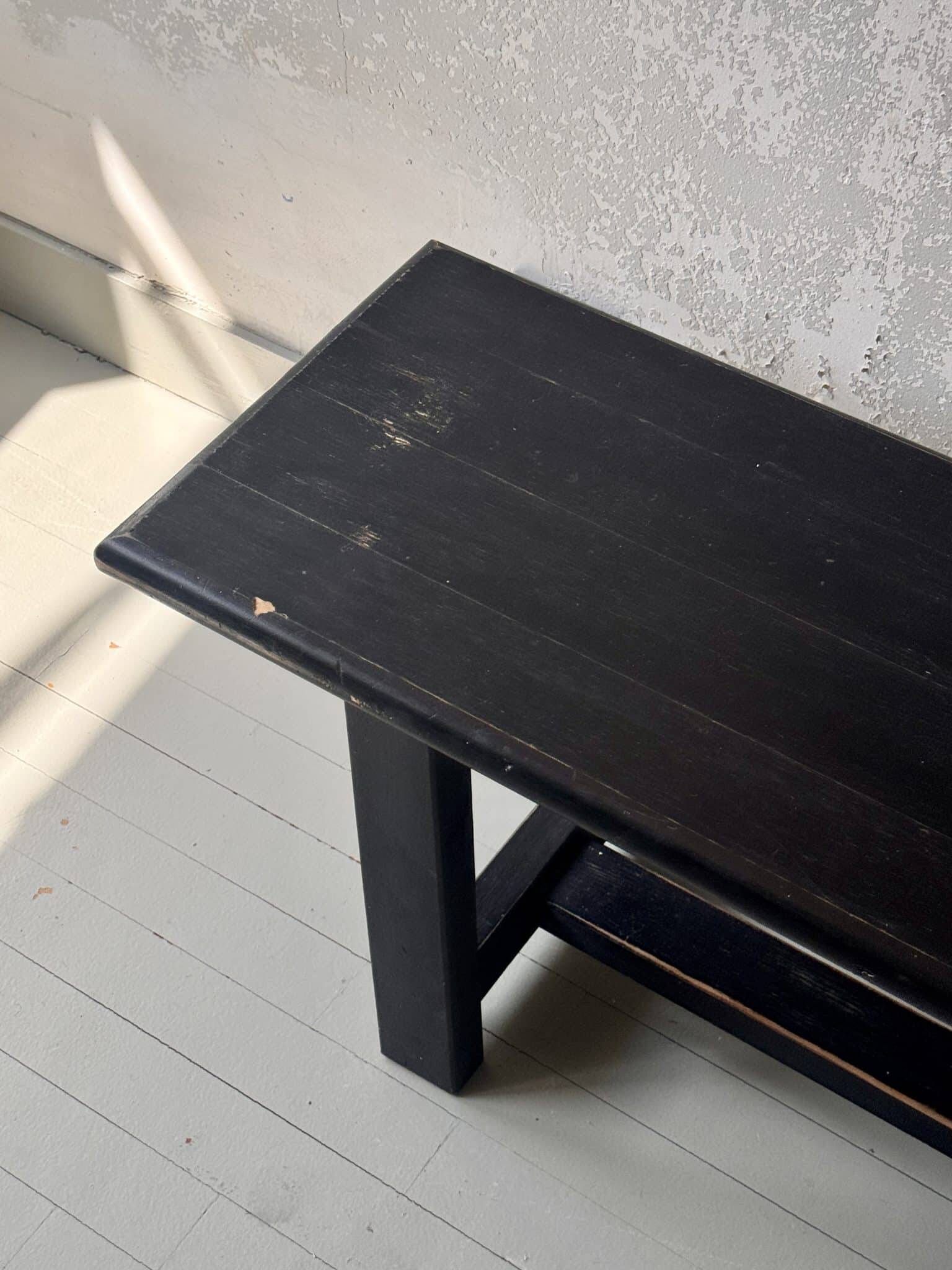 Antique black patinated wooden bench