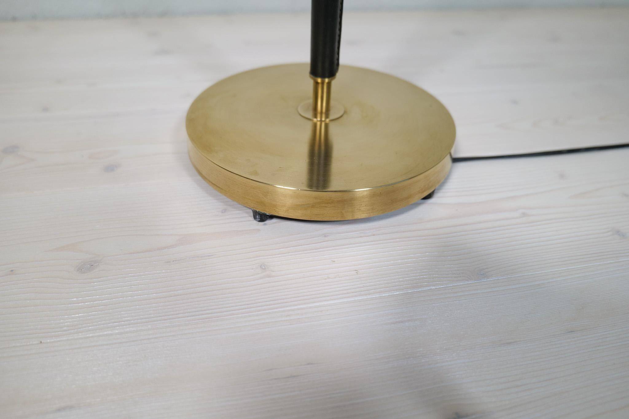 Mid-century black leather and brass floor lamp by Falkenbergs Belysning, Sweden, 1960s.