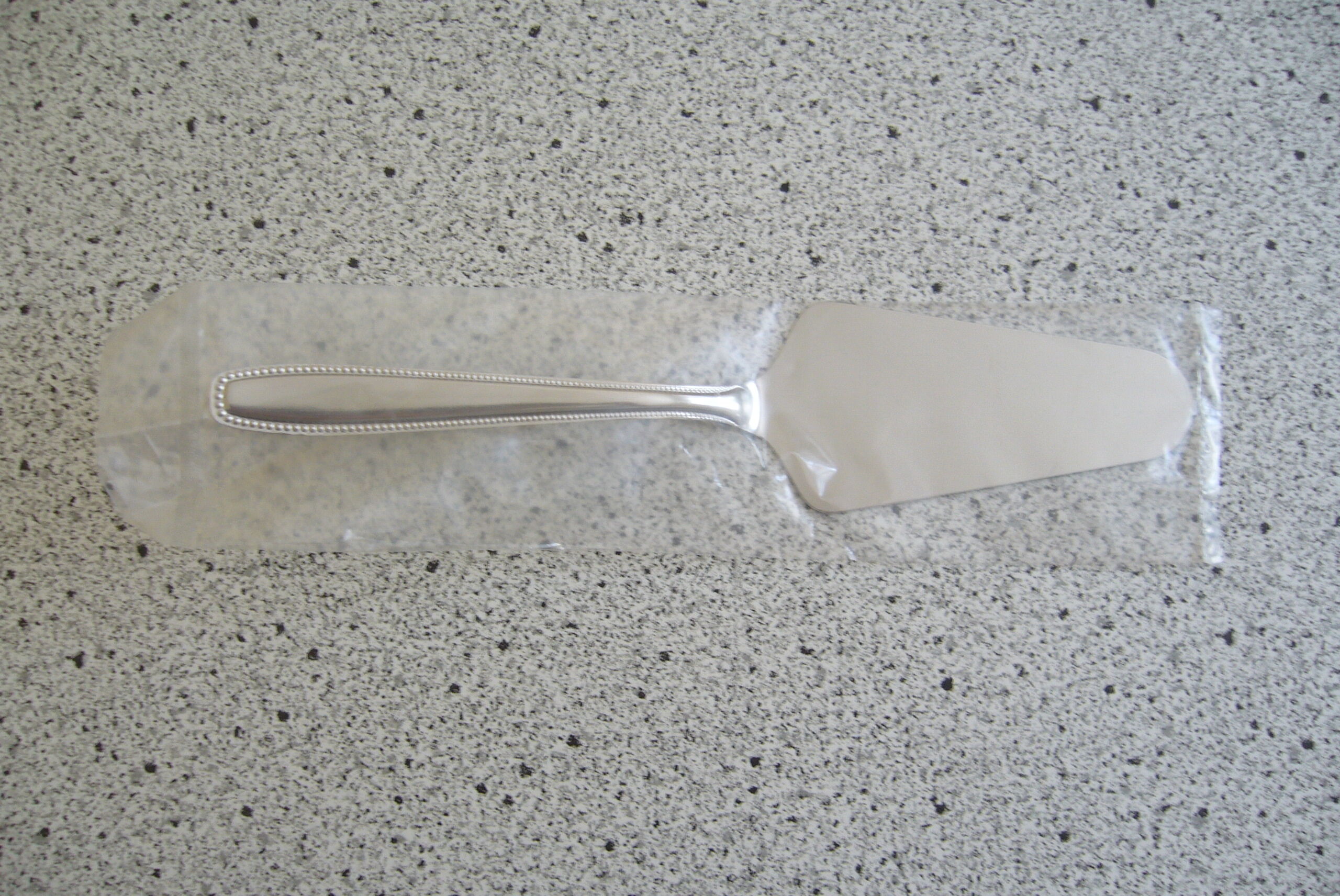 Presentation plate, cake shovel and 6 small spoons