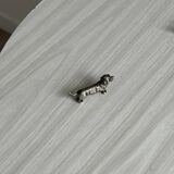 6 metal knife holders in the shape of small dogs