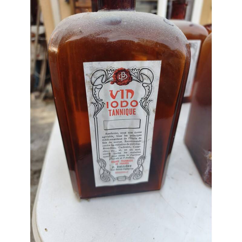 Set of 41 brown glass pharmacy bottles.
