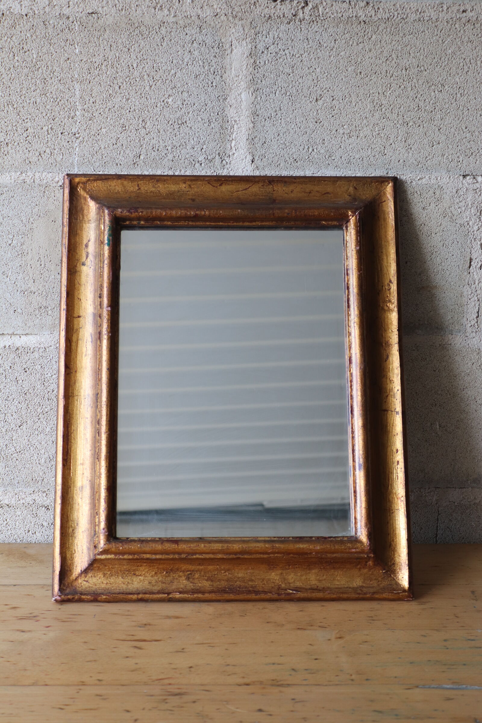 Miroir ancien en bois doré 42x52cm