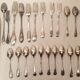 Set of mismatched silvered metal cutlery