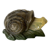Old snail piggy bank in barbotine
