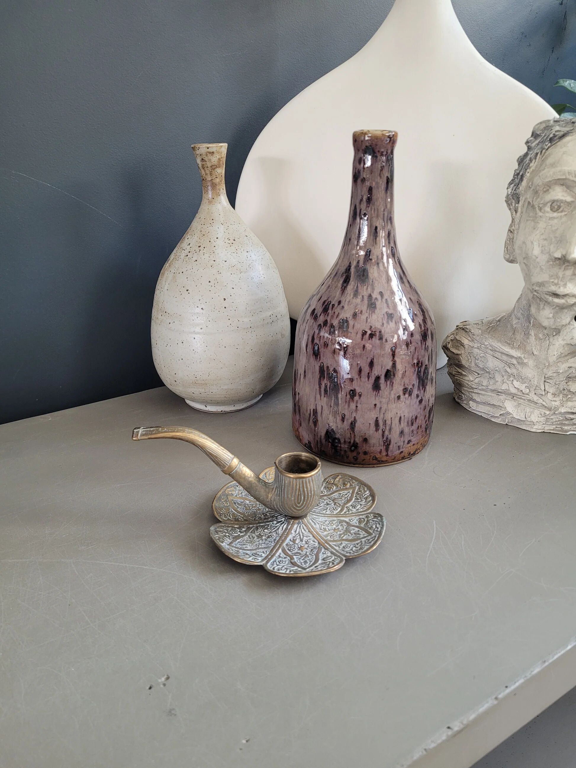 Ornate brass pipe candlestick