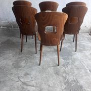 Set of six plywood dining chairs by Baumann, France, 1950s.