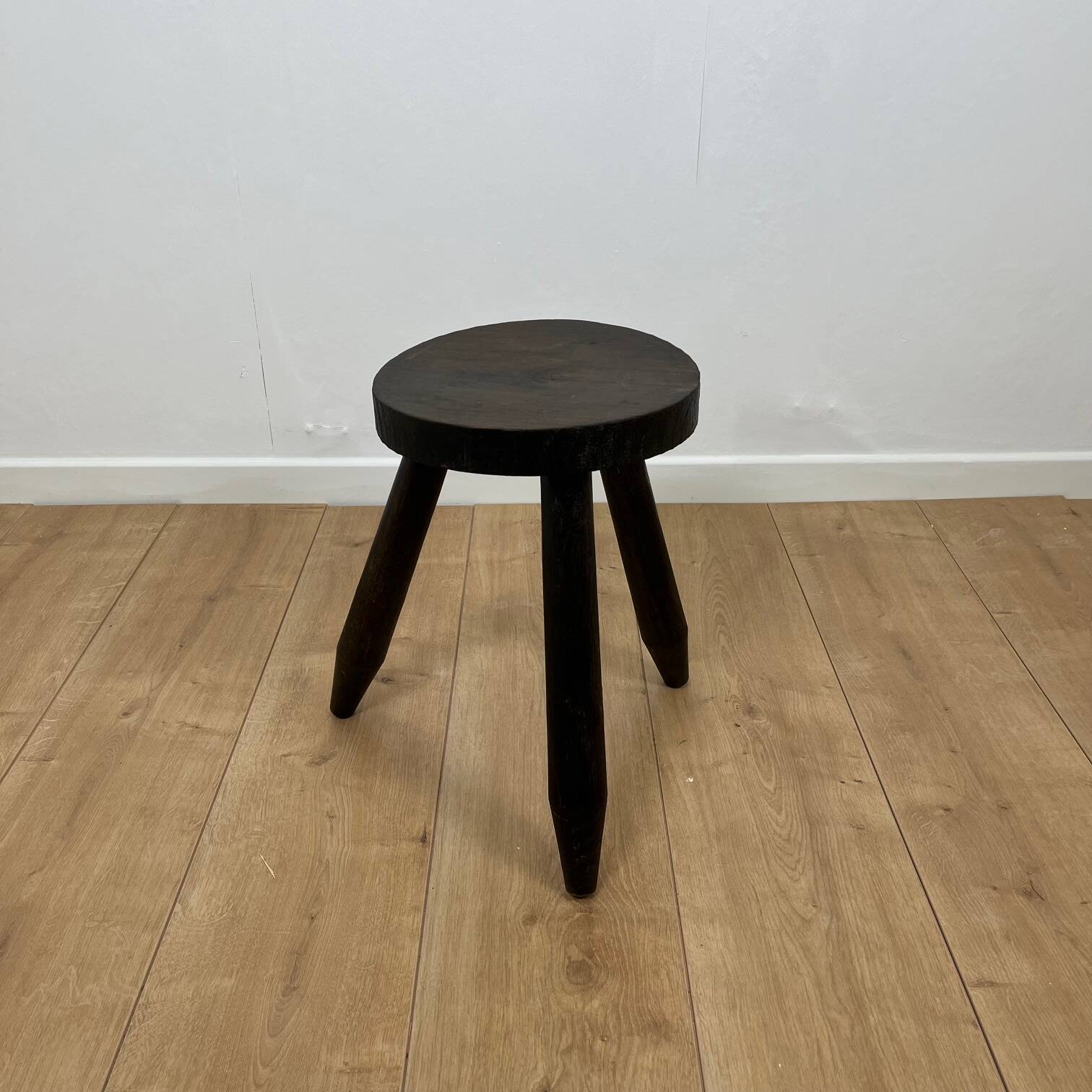 Small brutalist tripod stool in solid wood, 1960