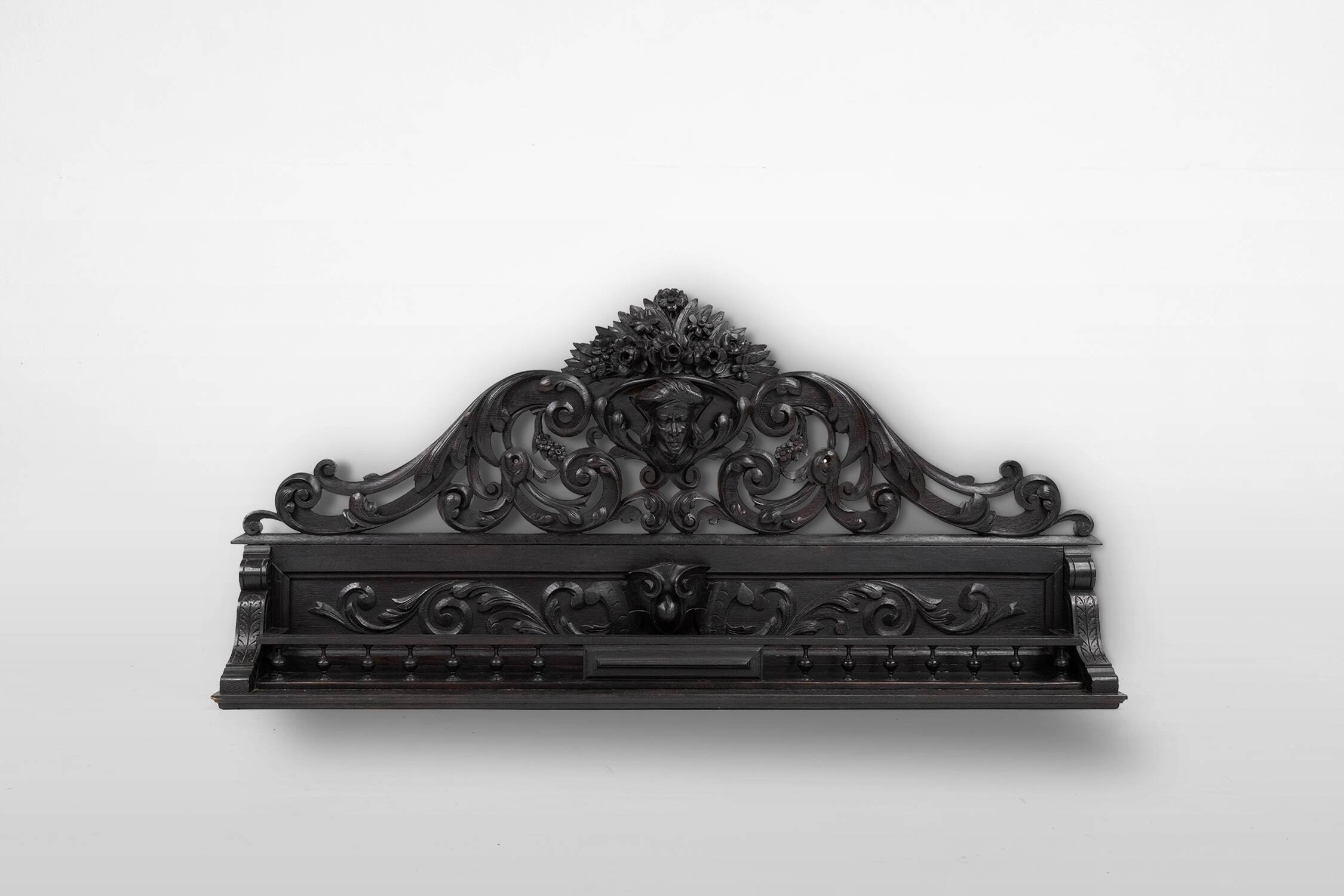 Richly carved baroque black wooden sculptured shelf, France ca. 1850