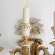Pair of Louis XVI style wall lights in gilded and lacquered wood. Circa 1900.