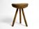 1900s hand-carved three-legged solid wood stool with a fantastic patina