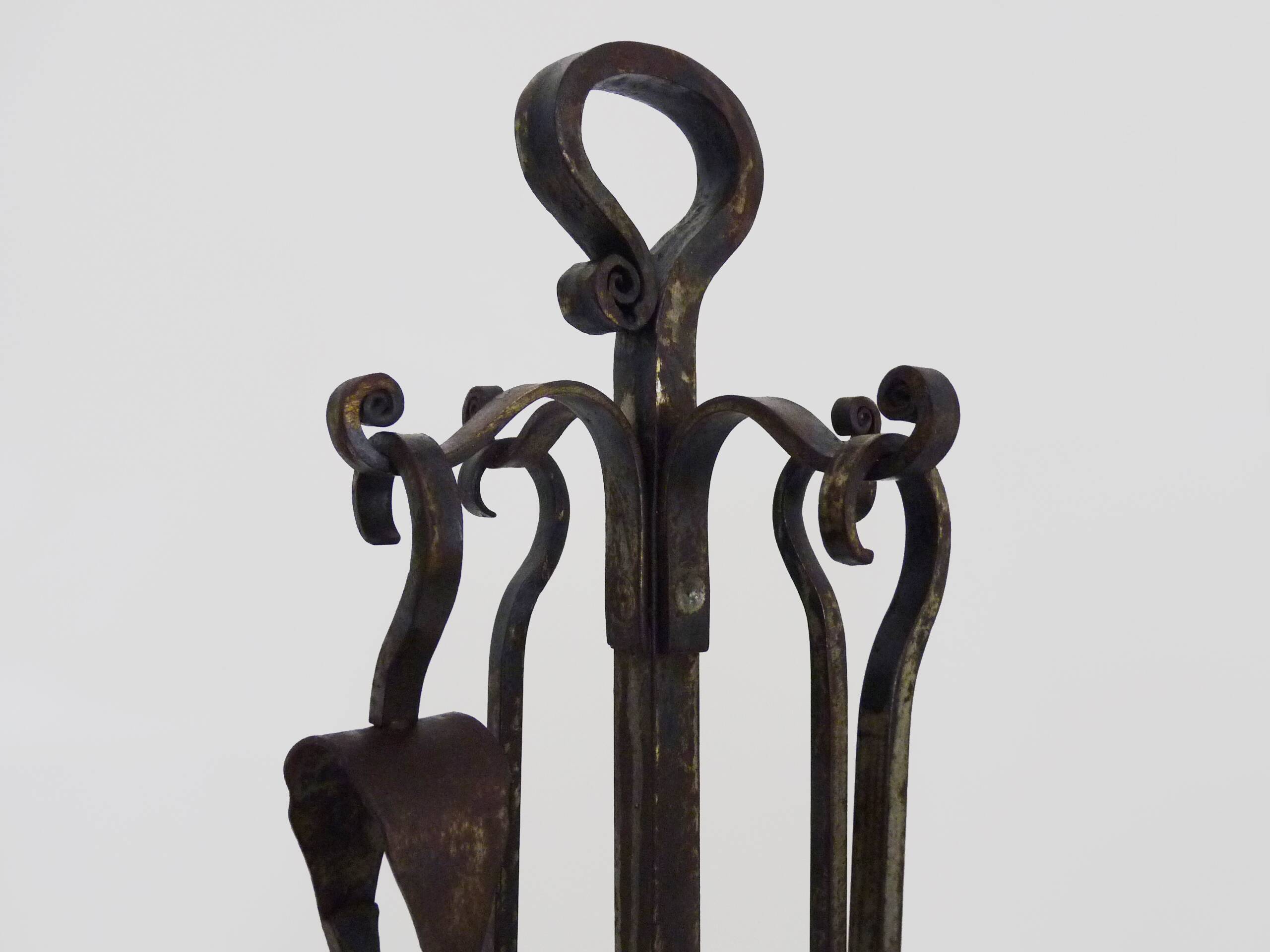 Pair of wrought iron andirons with 19th century fireplace set