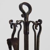 Pair of wrought iron andirons with 19th century fireplace set